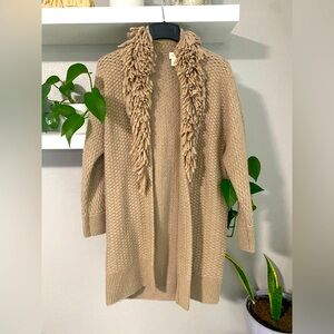 Woman’s knit fringe cardigan